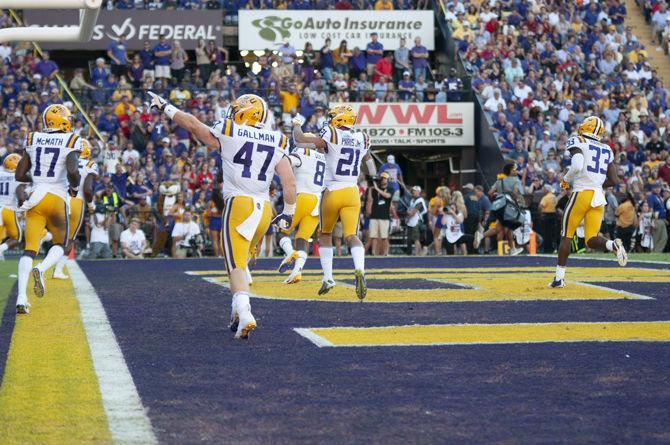 LSU senior fullback Trey Gallman (47) points to fans after a victory over Georgiaon Saturday, Oct. 13,2018.