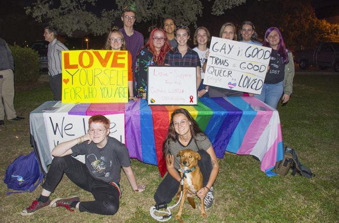 LSU students protest outside of Christ the King Catholic Church on Tuesday, Oct. 30, 2018.