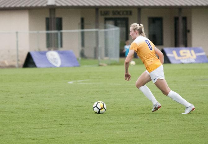 LSU freshman defender Shannon Cooke (8) dribbles the ball during the Tigers' 2-0 win over the Samford Bulldogs on Sunday, Sept. 9, 2018, at the LSU Soccer Complex.