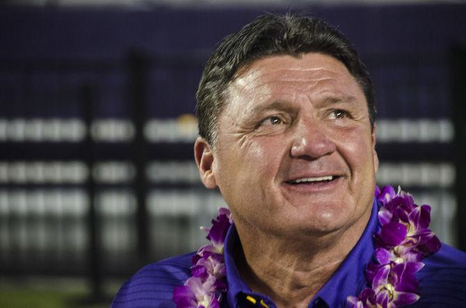 LSU coach Ed Orgeron signs autographs for fans after the purple team&#8217;s 28-27 victory against the gold team during the Spring Game on Saturday, April 21, 2018.