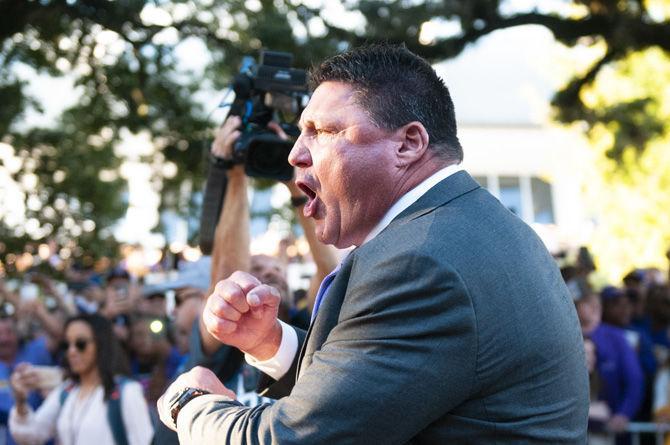 Head Coach Ed Orgeron leads his players down Victory Hill before the Alabama game on Saturday, Nov. 3, 2018.