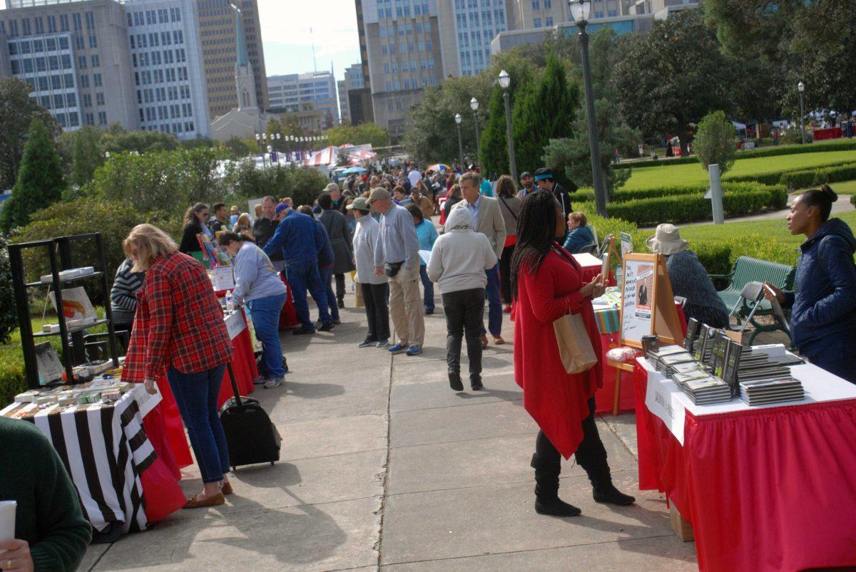 Festival goers browse tables at the 2017 Louisiana Book Festival. The 2018 LBF will take place in downtown Baton Rouge at the State Library, the State Capitol and surrounding areas on Nov. 10.