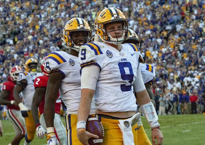 LSU junior quarterback Joe Burrow (9) celebrates after running the ball during LSU's 36-16 win against Georgia on Saturday, Oct. 13, 2018, at Tiger Stadium