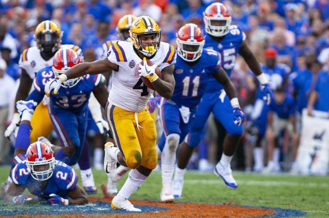 LSU senior running back Nick Brossette (4) runs to the end zone during the Tigers&#8217; 27-19 loss against the University of Florida on Saturday, Sept. 2018 in Ben Hill Griffin Stadium.