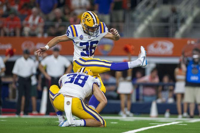 LSU sophomore placekicker Cole Tracy (36) kicks the ball during the Tigers' 33-17 victory against Miami in the AdvoCare Classic on Sunday, Sept. 2, 2018 in AT&amp;T Stadium in Arlington, Texas.