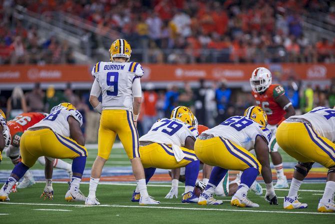 LSU junior quarterback Joe Burrow (9) prepares for a play during the Tigers' 33-17 victory over Miami in the AdvoCare Classic on Sunday, Sept. 2, 2018 at AT&amp;T Stadium in Arlington, Texas.