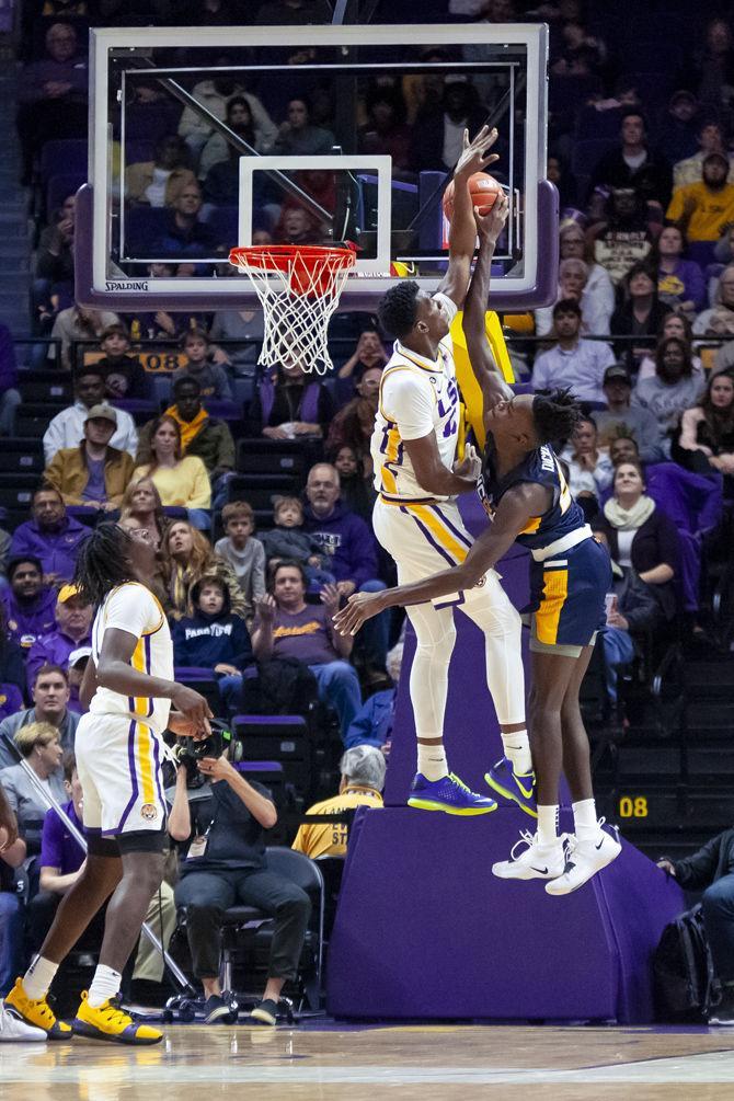 LSU senior forward Kavell Bigby-Williams (11) blocks a shot during the Tigers&#8217; 97-91 victory over UNC Greensboro in the PMAC on Friday, Nov. 9, 2018.