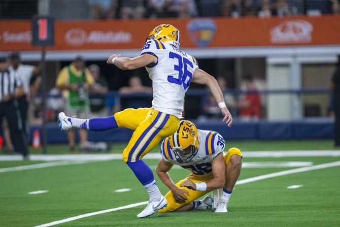 LSU sophomore placekicker Cole Tracy (36) kicks the ball during the Tigers' 33-17 victory against Miami in the AdvoCare Classic on Sunday, Sept. 2, 2018 in AT&amp;T Stadium in Arlington, Texas.