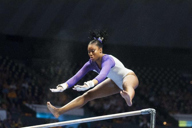 LSU all-around sophomore Kennedi Edney competes in the bars competition during the Tigers&#8217; 198.125-195.525 victory over Arizona on Saturday, March 17, 2018, in the PMAC.