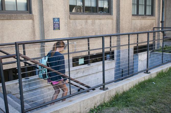 A student enters the Center for Assessment and Evaluation on Wednesday, October 14, 2015, in Himes Hall.