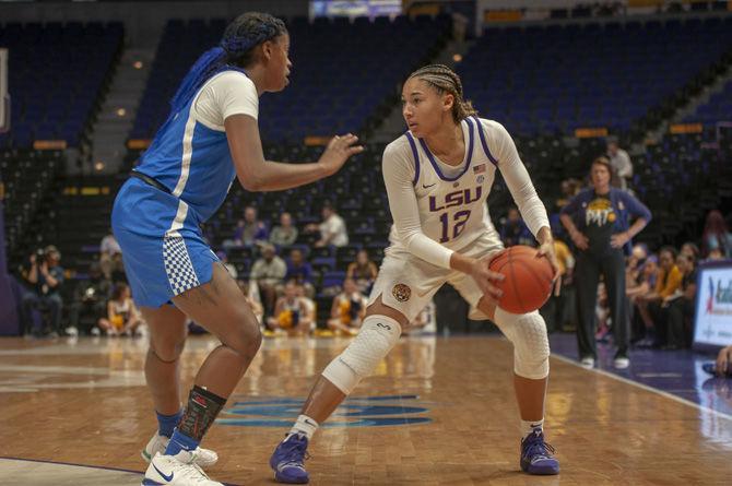 LSU junior guard Mercedes Brooks (12) looks for pass on Thursday, Jan. 17, 2018 during the Tigers&#8217; 60-64 loss against Kentucky in the PMAC.