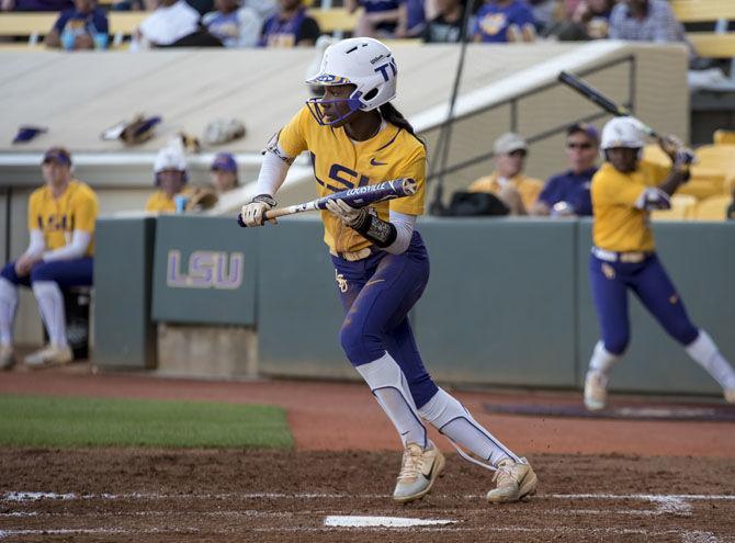 LSU sophomore outfielder Aliyah Andrews (4) bunts the ball during LSU&#8217;s 4-0 victory over University of South Alabama at Tiger Park on Tuesday, April 24, 2018.