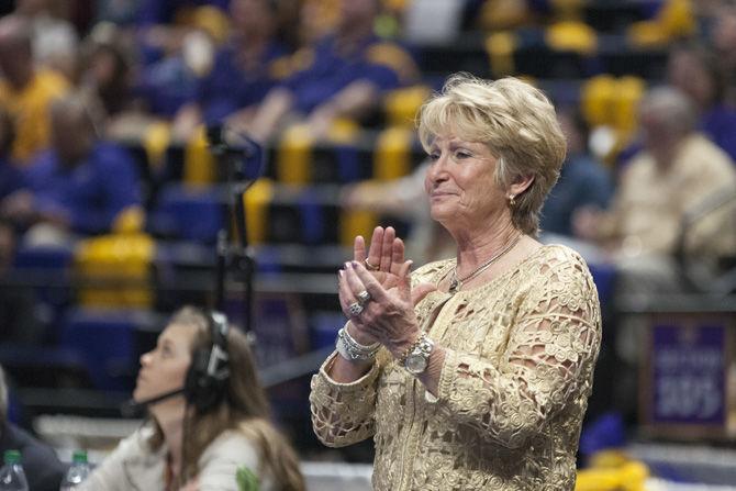 LSU gymnastics coach D-D Breaux cheers on her team during the Tigers' 198.100-195.625 victory over Auburn on Sunday, March 4, 2018, in the PMAC.