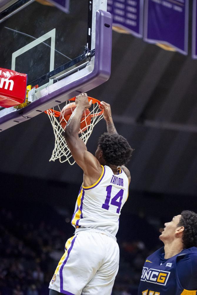 LSU junior guard Marlon Taylor (14) dunks the ball during the Tigers&#8217; 97-91 victory over UNC Greensboro in the PMAC on Friday, Nov. 9, 2018.