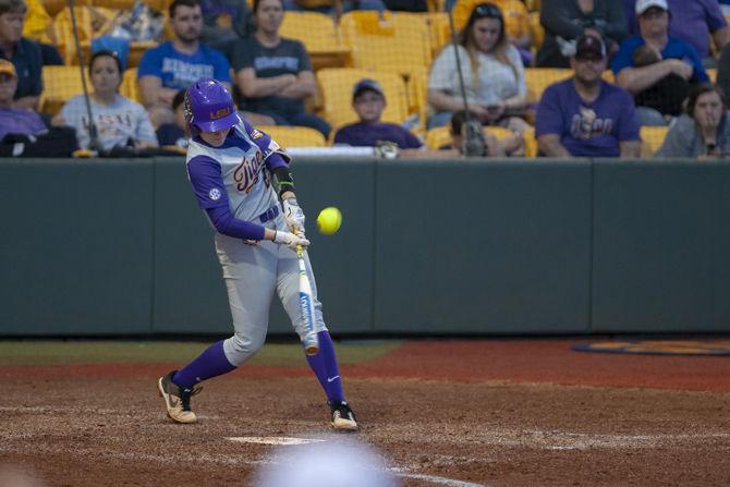 LSU junior infielder Amanda Doyle (22) hits the ball during the Lady Tigers' 4-0 victory over Memphis on Friday, Feb. 21, 2019, in Tiger Park.