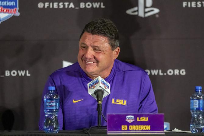 LSU coach Ed Orgeron answers questions after the Tigers' 40-32 victory over UCF in State Farm Stadium on Tuesday, Jan. 1, 2019