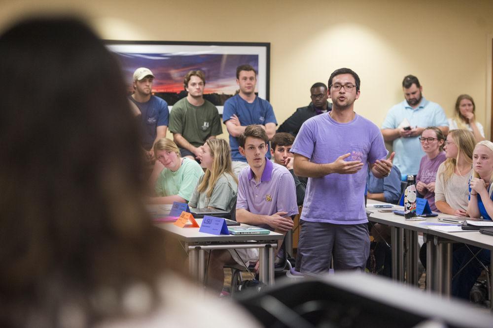 Student body senator Cameron Burris asks a series of questions surrounding Student Media funding during the student senate meeting on Tuesday April 24, 2018, in the LSU Student Union.