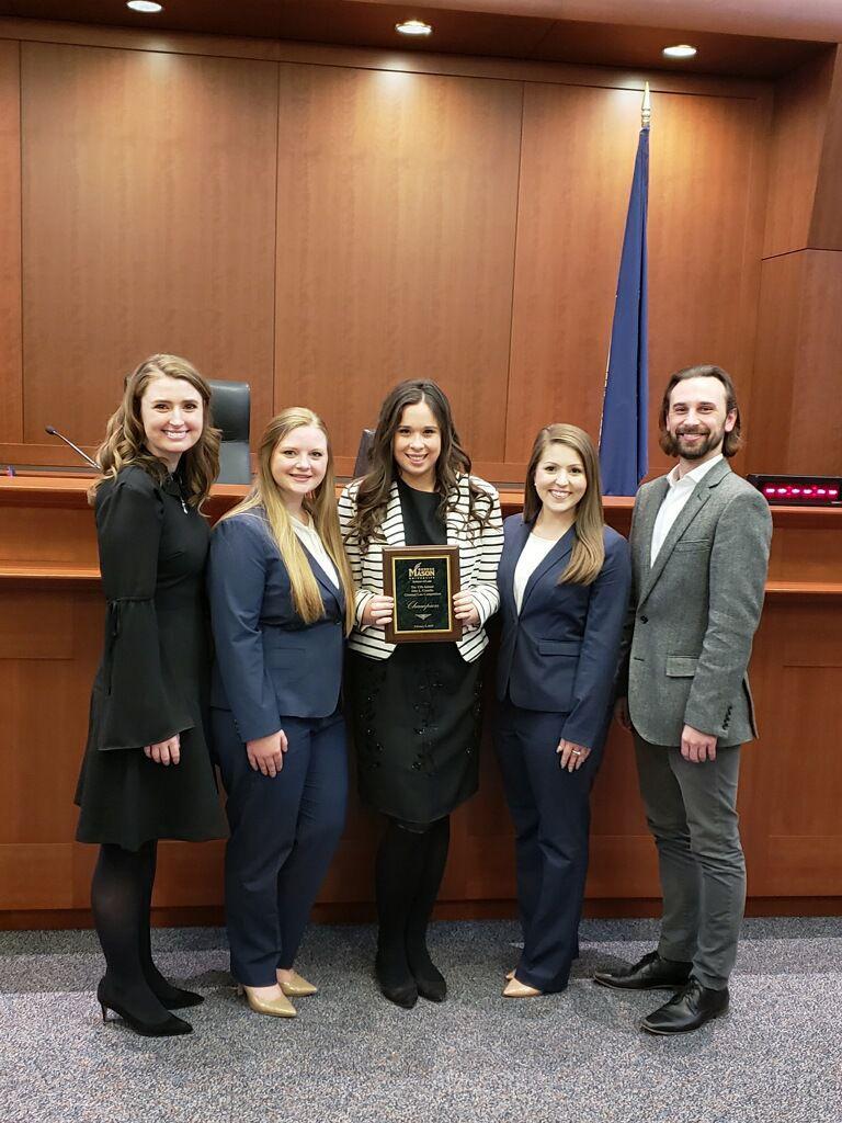 LSU Law Center alumni Lindsay Blouin and&#160;Joshua Newville coached current law students&#160;Allena McCain, Elise Benezech and Brooke Delaune for their criminal trial competition.&#160;