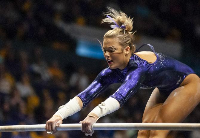 LSU&#160;all-around sophomore Bridget Dean performs a routine on the bars during the Tigers' 197.500-197.425 loss to Florida on Friday, Jan. 18, 2019 in the PMAC.