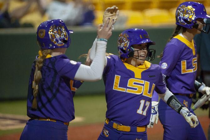 LSU senior infielder Amber Serrett celebrates after a run during the Lady Tigers' 19-1 victory over Tulsa, Thursday, Feb. 7, 2019, in Tiger Park.