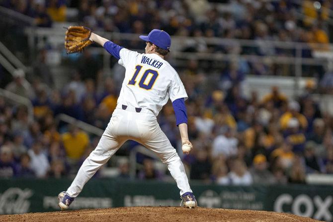 LSU sophomore pitcher Eric Walker (10) pitches in the fifth inning during the Tigers' 12-7 win against ULM on Friday, Feb. 15, 2019, at Alex Box Stadium.