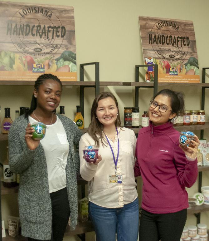 Members of the LSU food science club pose with some of their products on Friday, Feb. 1, 2019, in the Animal and Food Science Building.