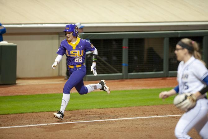 LSU infielder Amanda Doyle (22) runs to home plate during the Lady Tigers' 19-1 victory over Tulsa, Thursday, Feb. 7, 2019, in Tiger Park.