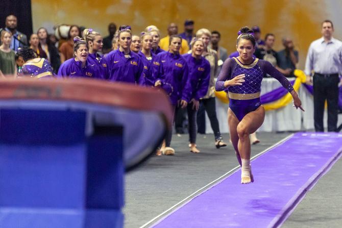 LSU senior all-around Sarah Finnegan performs a vault during the Tigers' 197.650-195.475 victory over Mizzou on Sunday, Feb. 17, 2019.