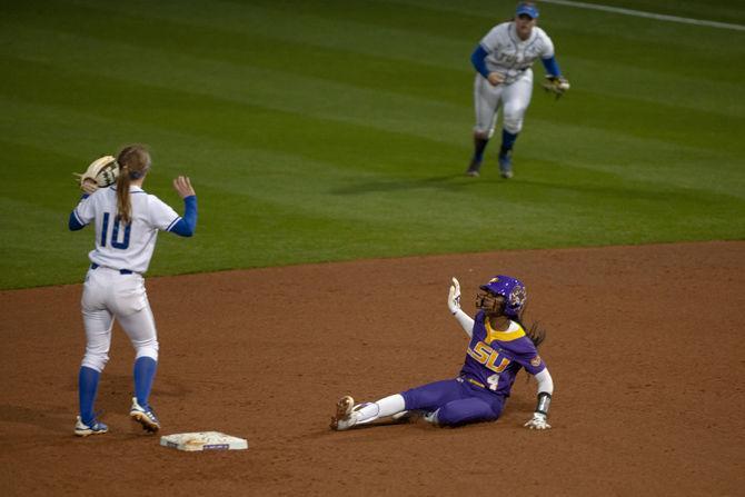 LSU junior outfielder Aliyah Andrews (4) slides into second base during the Lady Tigers' 19-1 victory over Tulsa, Thursday, Feb. 7, 2019, in Tiger Park.