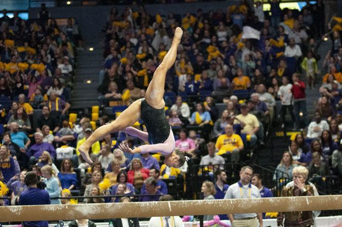 LSU senior Sarah Finnegan performs her balance beam routine during the Tigers' victory against NC State on Friday, February 1, 2019, in the PMAC.