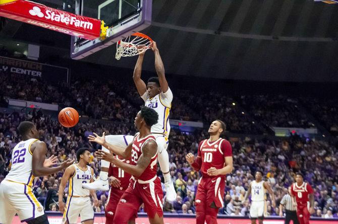 LSU senior forward Kavel Bigby-Williams(11) dunks the ball during the Tigers' 89-90 loss to Arkansas on Saturday, Feb. 2, 2019, in the PMAC.