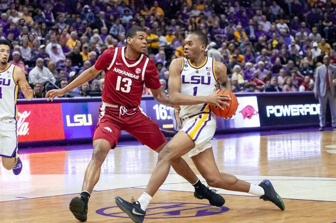 LSU freshman guard Ja'vonte Smart (1) drives to the basket during the Tigers' 89-90 loss to Arkansas on Saturday, Feb. 2, 2019, in the PMAC.