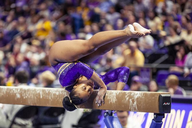 LSU junior all-around Kennedi Edney performs on the balance beam during the Tigers' 198.150-196.375 victory over Oregon State in the PMAC on Friday, March 8, 2019.