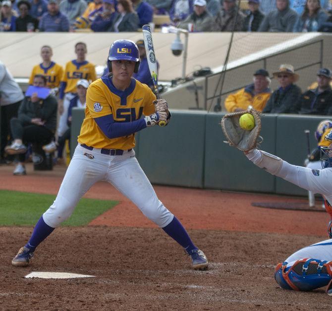 LSU senior infielder Amanda Sanchez (20) watches a pitch during the Tigers’ 8-0 win over the Florida Gators on Sunday, March 17, 2019, at Tiger Park.