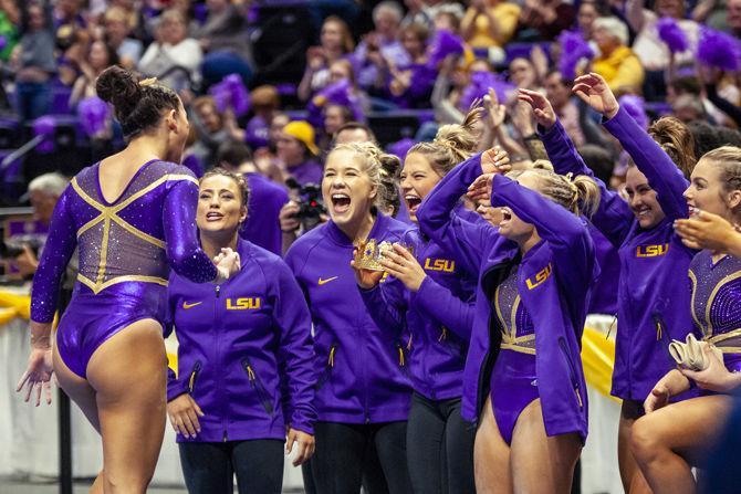 LSU senior all-around Sarah Finnegan celebrates after her balance beam routine during the Tigers' 198.150-196.375 victory over Oregon State in the PMAC on Friday, March 8, 2019.