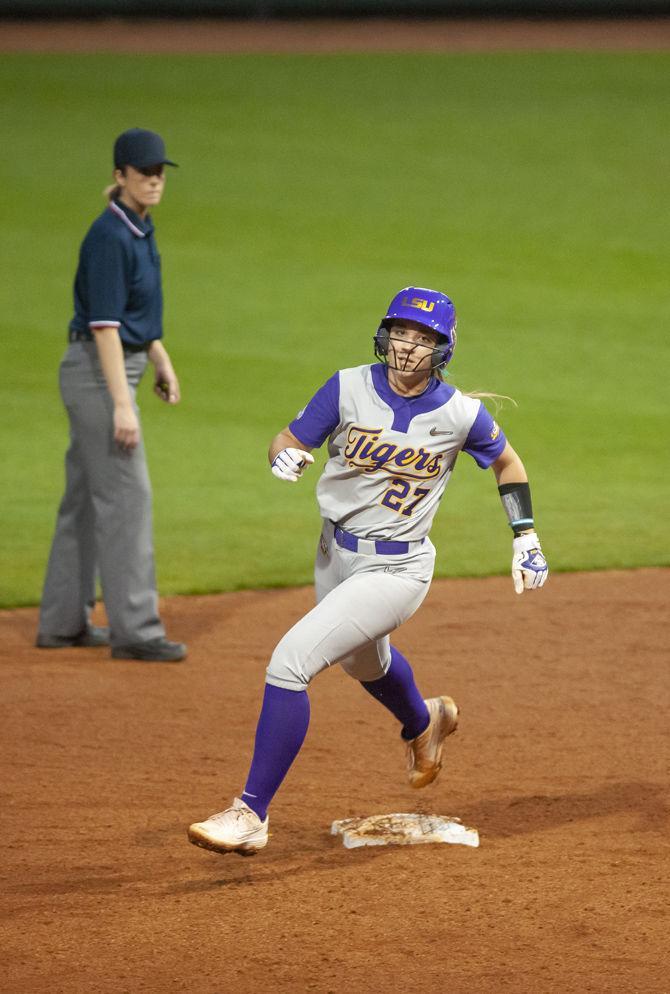 <p>LSU sophomore Shelbi Sunseri (27) runs to third during the Lady Tigers' 4-0 victory over Memphis on Friday, Feb. 21, 2019, in Tiger Park.</p>