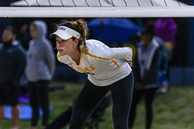 LSU freshman Allison Coens (2) prepares for a play during the Tigers' 5-0 victory over Coastal Carolina on Friday, March 15, 2019, in the Beach Volleyball Facility.