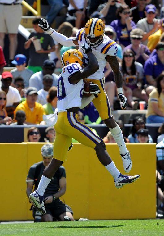 Junior wide receiver Jarvis Landry (80) celebrates with junior wide receiver Odell Beckham Jr. (3) after a score April 20, 2013 during the white squad's 37-0 victory against the purple squad in the National L Club Spring Game in Tiger Stadium.