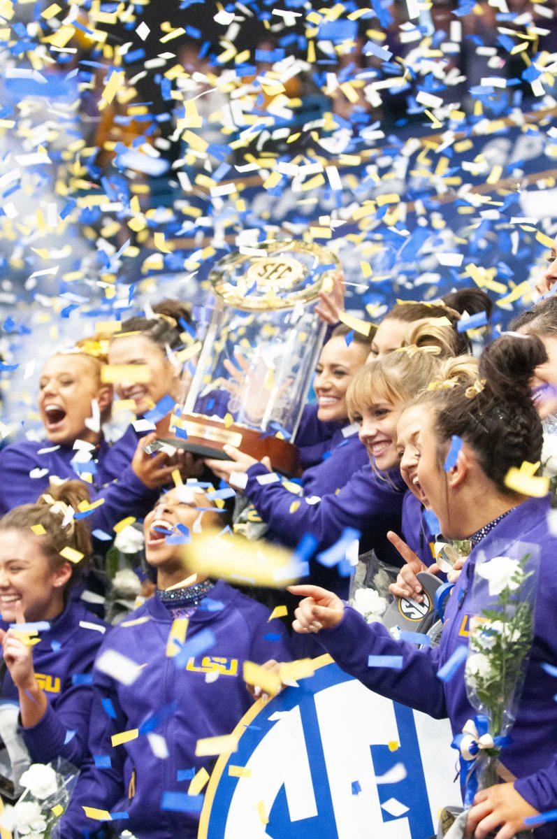 LSU Gymnastics celebrate placing first during the SEC Championship meet on Saturday, March 23, 2019, in the Smoothie King Center.