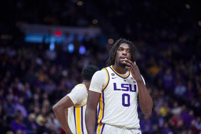 LSU freshmen Forward Naz Reid (0) checks his mouth after taking a hit to the face during the Tigers' 77-82 loss to Florida on Wednesday, Feb. 20, 2019, in the PMAC.