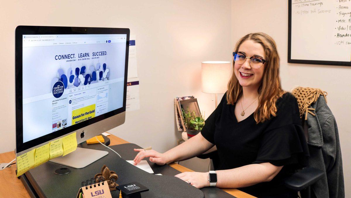 Amanda Rabalais works on content for the Center for Academic Success at her desk.