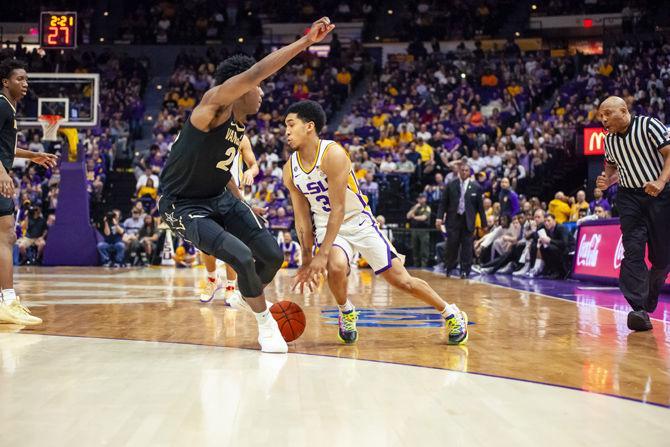 LSU sophomore guard Tremont Waters (3) shakes a defender during the Tigers' 80-59 victory over Vanderbilt on Saturday, March 9, 2019, in the PMAC.