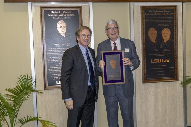 The official ribbon cutting ceremony for the Richard J.Dodson maritime collection at the law center on Friday.Mar.8.2019.