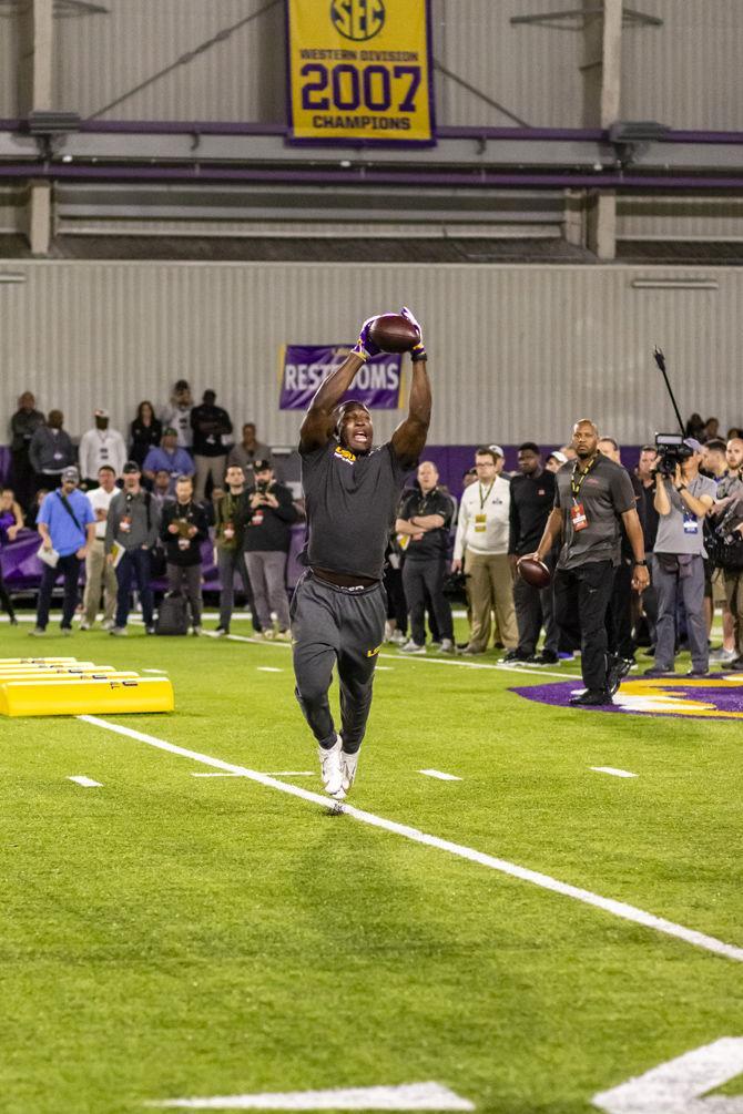 LSU linebacker Devin White (40) participates in LSU's Pro Day on Friday, March 22, 2019, in the Football Practice Facility.