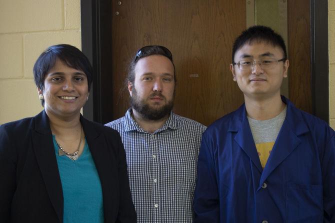 Chemistry assistant professor Revati Kumar, chemistry postdoctoral researcher Rolf David and chemistry grad student Pu Du stand outside of their offices on Wednesday, March 20, 2019.