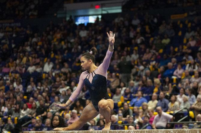 LSU senior Sarah Finnegan performs her balance beam routine during the Tigers' victory against NC State on Friday, February 1, 2019, in the PMAC.