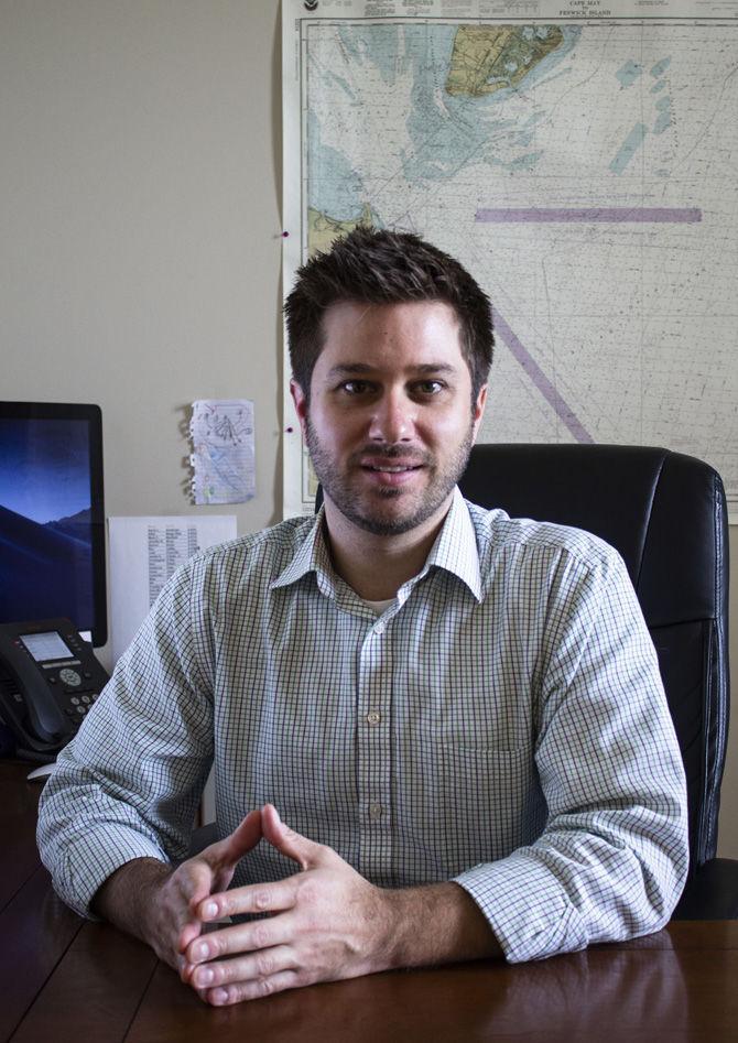 LSU Department of Oceanography and Coastal Sciences Assistant Professor Stephen Midway sits in his office on Monday, March 11, 2019.