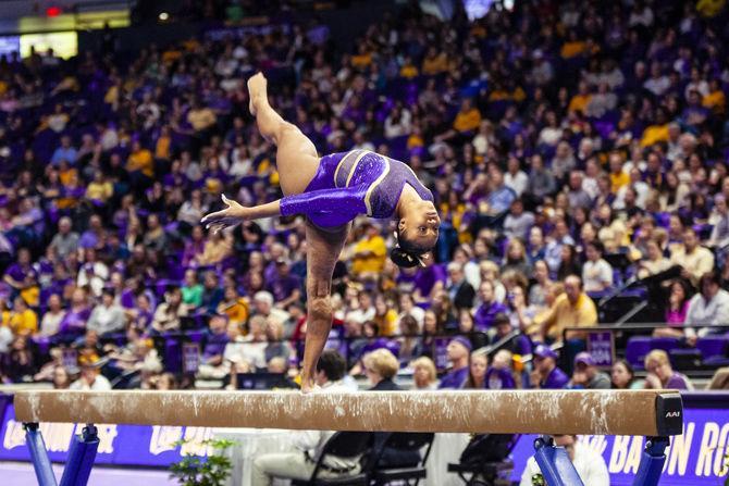 LSU junior all-around Kennedi Edney performs on the balance beam during the Tigers' 198.150-196.375 victory over Oregon State in the PMAC on Friday, March 8, 2019.