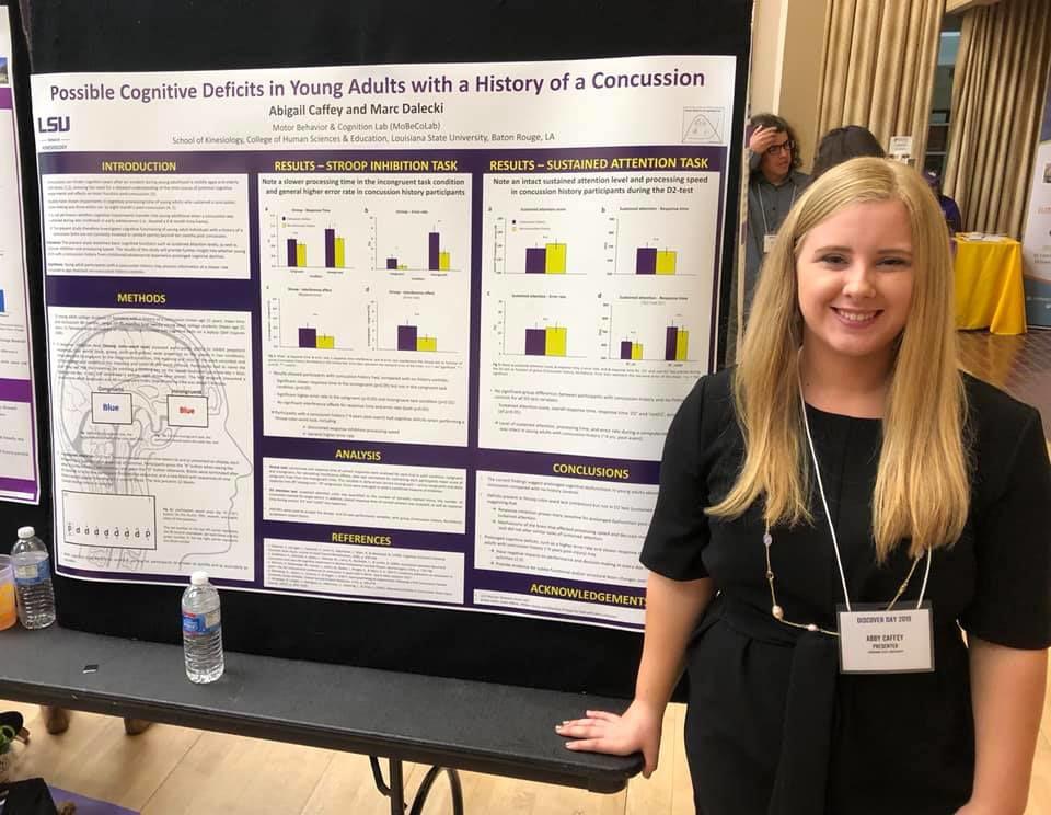 Kinesiology Senior Abby Caffey stands by her research presentation at LSU Discover Day on April 9th.