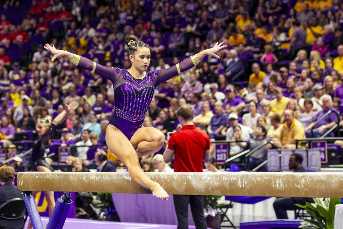 LSU senior all-around Sarah Finnegan performs on the balance beam during the second round of the gymnastics regionals on Saturday, April 6, 2019, in the PMAC.